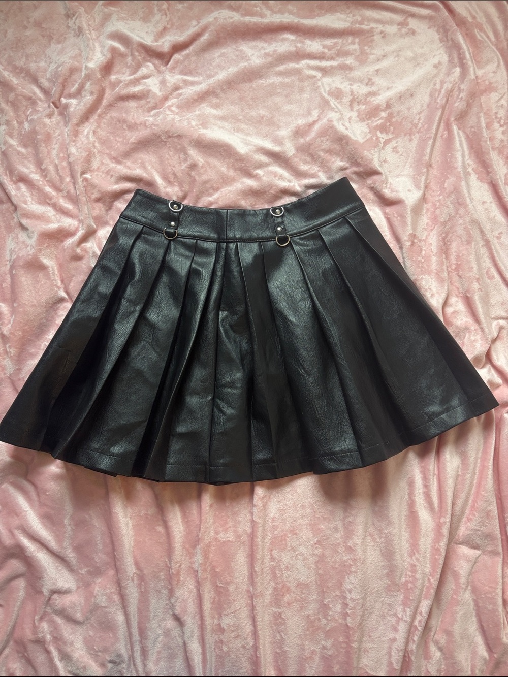 Pleated Faux Leather Mini Skirt in Black